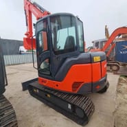 2023 Hitachi ZX60U mini excavator, rear three-quarter view