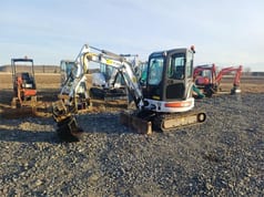 2009 Bobcat 428EG mini excavator, front three-quarter view 2009 Bobcat 428EG mini excavator, front three-quarter view