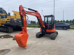 2023 Kubota U55-4 mini excavator, front three-quarter view