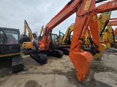 2024 Hitachi ZX135US crawler excavator, front three-quarter view 2024 Hitachi ZX135US crawler excavator, front three-quarter view