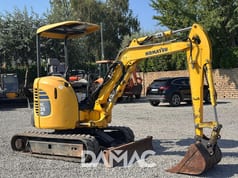 2014 Komatsu PC26MR-3 mini excavator, side view