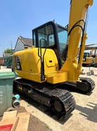 2023 Komatsu PC56-7 crawler excavator, rear three-quarter view