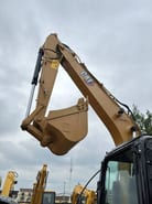 2024 Caterpillar 312D2 mini excavator boom and bucket view
