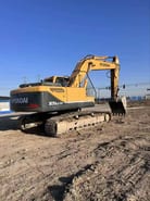 Hyundai 305LC-9T crawler excavator, rear three-quarter view