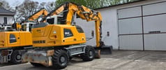 2017 Liebherr A914 COMPACT wheel excavator rear three-quarter view