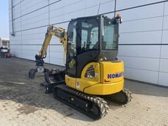 2024 Komatsu PC33E-6 mini excavator, rear three-quarter view