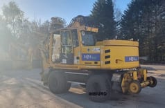 2012 Atlas 1604 KZW wheel excavator, rear three-quarter view