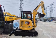 2023 Caterpillar 303.5E mini excavator, rear three-quarter view 2023 Caterpillar 303.5E mini excavator, rear three-quarter view