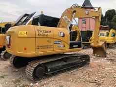 CAT 312D2 GC excavator, rear three-quarter view