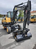 2021 Volvo EW60E wheel excavator, front three-quarter view
