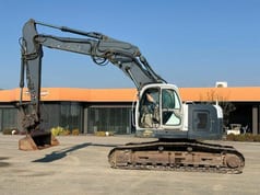 2007 New Holland E235SR-1ES crawler excavator, side profile view 2007 New Holland E235SR-1ES crawler excavator, side profile view