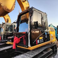 2023 Caterpillar 312D crawler excavator, side view of the cab