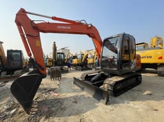 2023 Hitachi ZX75 crawler excavator, front three-quarter view 2023 Hitachi ZX75 crawler excavator, front three-quarter view