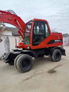 Doosan DH150W-7 wheel excavator, side view Doosan DH150W-7 wheel excavator, side view
