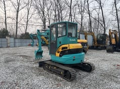 2022 Kubota U35 mini excavator, rear three-quarter view
