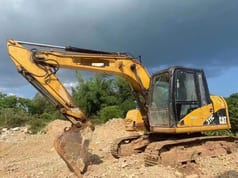 2022 Caterpillar 311C crawler excavator side view
