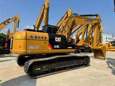 2022 Caterpillar 323D2L crawler excavator, rear three-quarter view 2022 Caterpillar 323D2L crawler excavator, rear three-quarter view