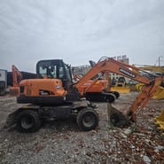 2018 Doosan DX60W wheel excavator side view 2018 Doosan DX60W wheel excavator side view