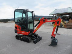 2022 Kubota KX016-4 mini excavator, side view 2022 Kubota KX016-4 mini excavator, side view