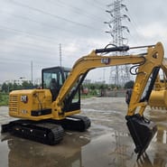 2022 Caterpillar 305.5E2 mini excavator, side view