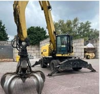 2015 Caterpillar 302.2 material handler, front three-quarter view