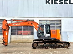 2013 Hitachi ZX225USLC-3 crawler excavator, side view 2013 Hitachi ZX225USLC-3 crawler excavator, side view