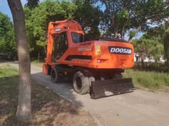2021 Doosan DH210W-9C wheel excavator, rear three-quarter view 2021 Doosan DH210W-9C wheel excavator, rear three-quarter view