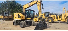 2024 Caterpillar M318-07 wheel excavator, front three-quarter view