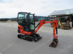 2022 Kubota KX018-4 mini excavator, side view 2022 Kubota KX018-4 mini excavator, side view