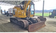 Komatsu PC138US-8 crawler excavator, front three-quarter view