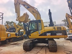 Escavatore cingolato Caterpillar 320CL del 2023, vista laterale