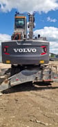 2018 Volvo EW240EMH material handler rear view