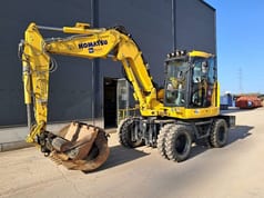 2023 Komatsu PW98MR-11E0 wheel excavator, side profile view