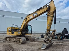 2018 Caterpillar 320GC crawler excavator, side view