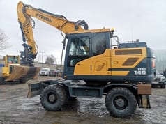 2016 Hyundai HW140 wheel excavator, side profile view