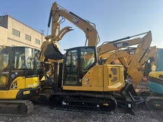 Caterpillar 307.5 crawler excavator, side profile view Caterpillar 307.5 crawler excavator, side profile view