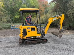 2019 JCB 19C-1 mini excavator, side view 2019 JCB 19C-1 mini excavator, side view