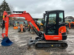 2023 Kubota KX037-4 mini excavator, side view