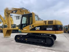 Pelle sur chenilles Caterpillar 320CL 2024 vue de côté Pelle sur chenilles Caterpillar 320CL 2024 vue de côté