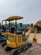 2020 Komatsu PC18MR mini excavator, rear three-quarter view 2020 Komatsu PC18MR mini excavator, rear three-quarter view