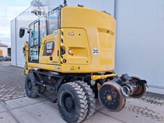 2019 Caterpillar M323F wheel excavator, rear three-quarter view