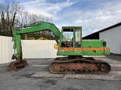 1985 Poclain 90 crawler excavator, side view