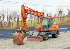 2012 Doosan DX160W wheel excavator, side profile view