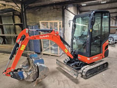 2022 Kubota KX016-4 mini excavator, side view
