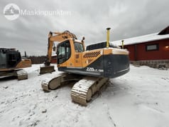 2015 Hyundai 220LC-9A crawler excavator, rear three-quarter view