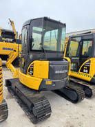 2020 Komatsu PC35MR mini excavator, rear three-quarter view 2020 Komatsu PC35MR mini excavator, rear three-quarter view