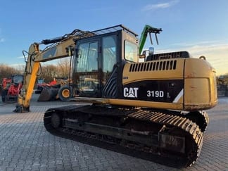 2010 Caterpillar 319DL Rupsgraafmachine