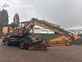 1990 CASE 1088P Wielgraafmachine