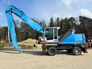 Pelle sur pneus Fuchs MHL340 2011