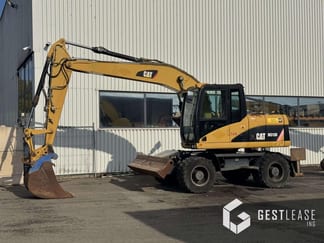 2008 Caterpillar M313D Excavadora sobre ruedas